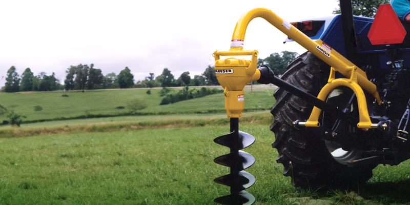 OPICO Post Hole digger in field
