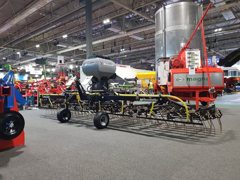 OPICO celebrate a 30-year partnership at LAMMA 2025 with a black and gold Harrow & Seeder